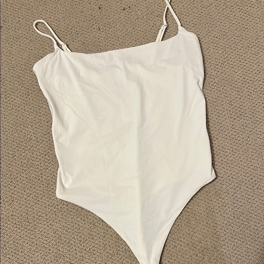 Suuksess White Bodysuit One Piece with Minimalist Design